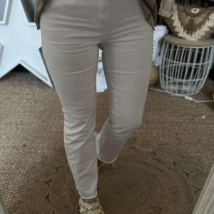 Jean bootcut blanc frangé