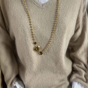 Sautoir cœur acier doré