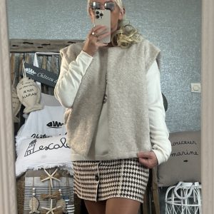 Veste sans manches pailleté beige