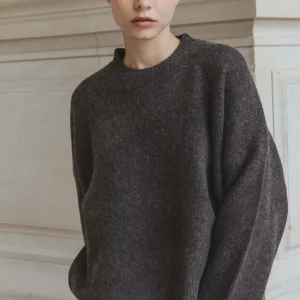 Ensemble pull et jupe courte en maille